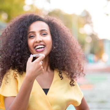 woman with invisalign
